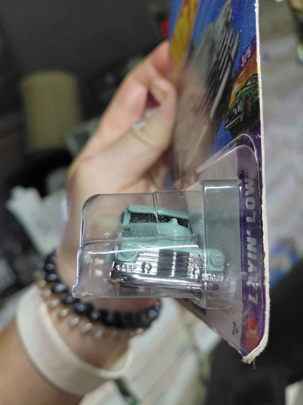 is the Hot Wheels '47 Chevy Fleetline in turquoise/green from the Layin' Low ser
